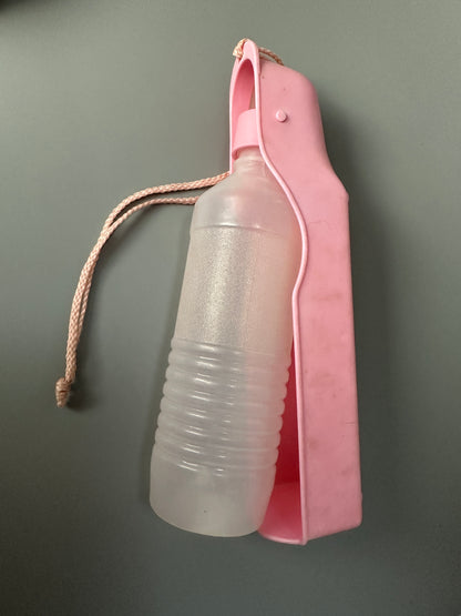 Set of two food bowls and water bottle for dog
